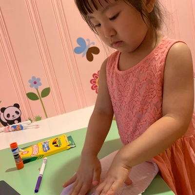 customer photo of Beanstalk.co Making her paper airplane
