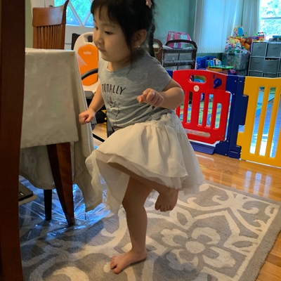 customer photo of Beanstalk.co Averie is hopping on one foot like a flamingo