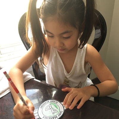 customer photo of Beanstalk.co Cassidy coloring her badge