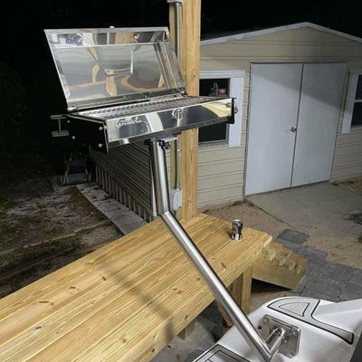 Kuuma grill mount on a port side stanchion