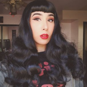 Black 1950s pinup style wig, curled with short fringe: Milena