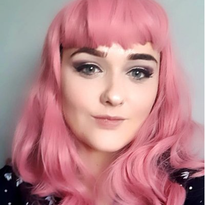 Dusty Pastel pink pinup style wig, with finger waves and a short fringe: Stevie