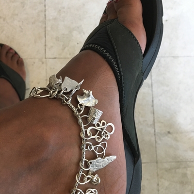 Crucian gold silver anklet loaded with all the assorted charms available  in 2018. 
