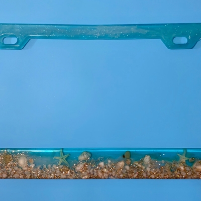 Ocean seashells Car plate frame.
