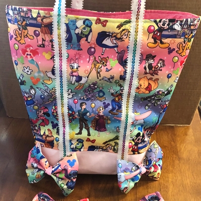 I made a library bag with the Disney fabric!