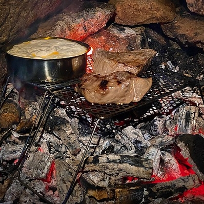 cooking up a feast after a full day hiking